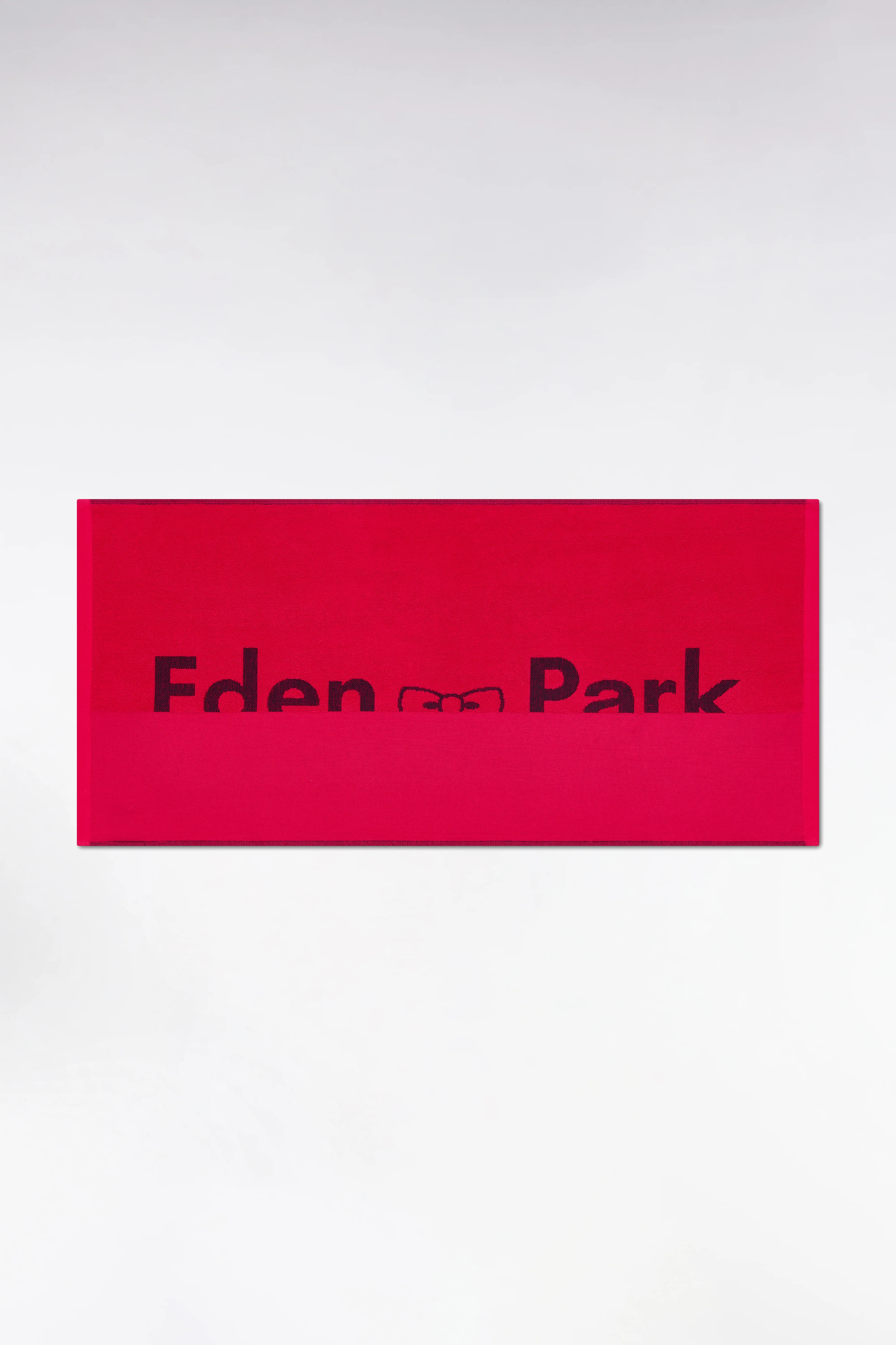 Drap de plage en coton éponge fuchsia jacquard Eden Park noir